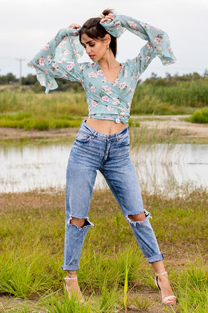 Queencii – Rose Floral Flare Wrap Top Light Blue Multicolor