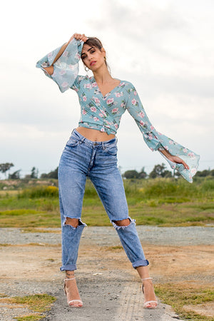 Queencii – Rose Floral Flare Wrap Top Light Blue Multicolor