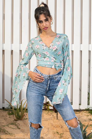 Queencii – Rose Floral Flare Wrap Top Light Blue Multicolor